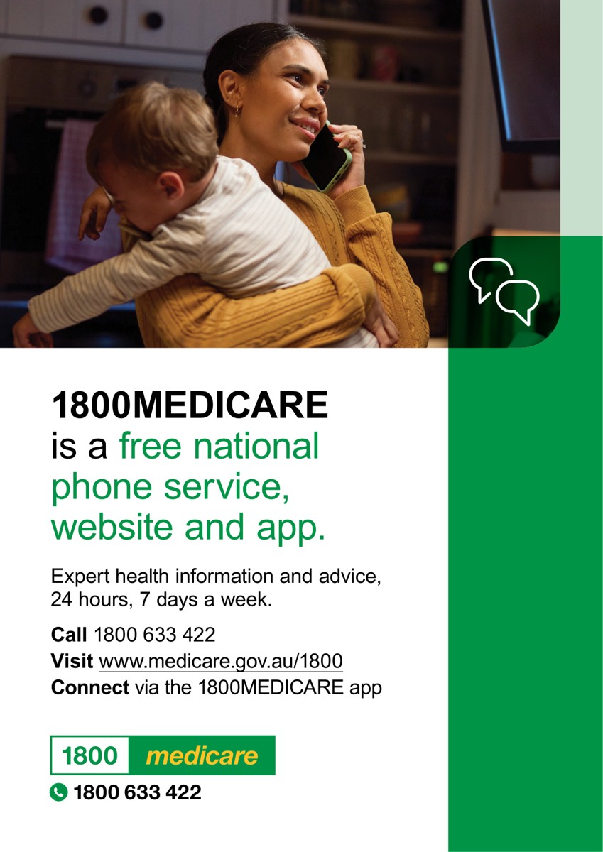A lady holding a child and using a phone on her left hand